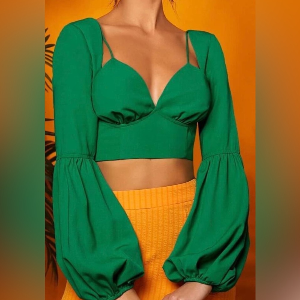 Green crop top with cutouts and balloon sleeves